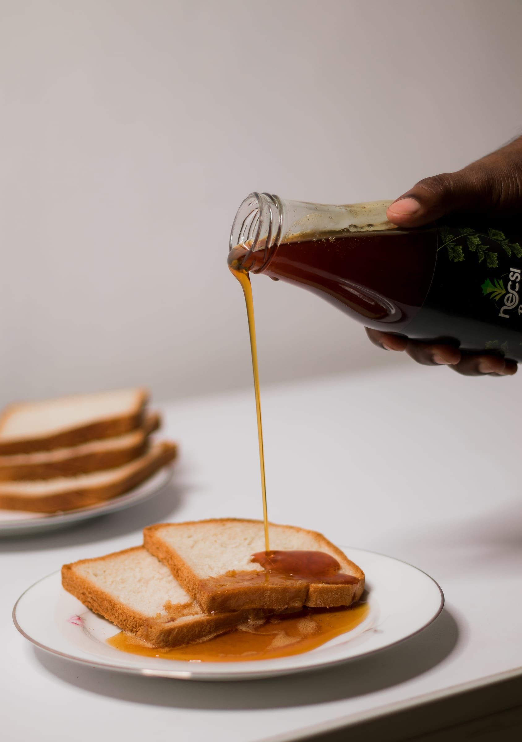 Necsi kithul treacle poured over toast